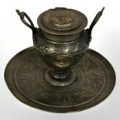 A French Empire style bronze inkwell with ceramic liner, width 14 cm.