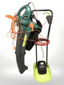 An electric lawn mower and a leaf blower