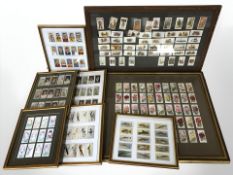 A group of framed sets of Wills cigarette cards.
