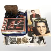 A pair of military binoculars in leather case, Oxford die cast cars, postcards, magazines,