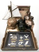 A miniature copper and brass diver's helmet, pair of reproduction ships lamps, glass floats,