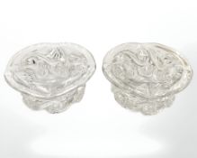 A pair of Baccarat crystal votive tea light candle stands, diameter 13cm.