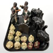 A group of jazz band figures, Oriental resin figures of Buddha, three carved ebony elephants.