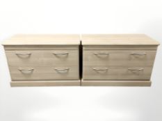 A pair of contemporary laminated two drawer chests, 91 cm W x 46 cm D x 61 cm H.