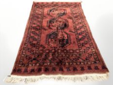 A Turkoman Bokhara rug, Afghanistan, 253 cm x 144 cm.