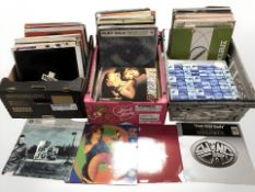 A large quantity of vinyl records including 90's dance, house music, etc.