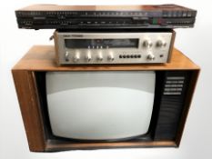 A vintage teak cased television,