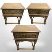 Three reproduction oak single drawer lamp tables,