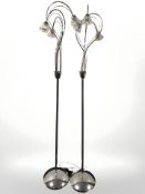 A set of four contemporary mirror finish metal standard lamps, height 166 cm.