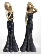 A pair of gilt composition and mosaic work figures of ladies, height 60 cm.