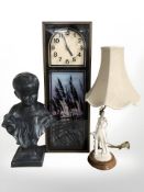 A ceramic bust of a boy,