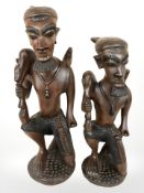 Two African carved hardwood figures, tallest 45 cm.