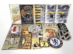 A group of reproduction enameled advertising signs, cast iron plaques including VW,