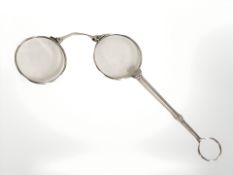 A pair of continental silver lorgnettes, stamped 935.
