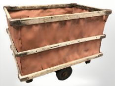 A pine framed trolley,