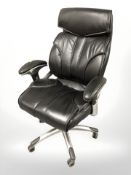 A stitched black leather office chair.