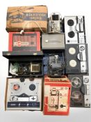 A group of vintage reel to reels, projectors, etc.