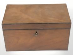 A 19th century walnut tea caddy.