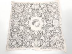 A Queen Elizabeth II lacework throw, 120 cm x 120 cm.