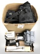 A group of camera bags, folding tripod,