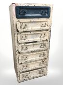 A 20th century industrial seven drawer chest,
