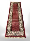 An Eastern woolen runner,