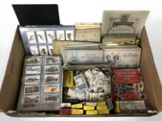 A large quantity of Wills and John Player cigarette cards, loose and in albums.