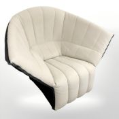 A Moel chair, by Inga Sempe for Ligne Roset, in black leather and beige upholstery,