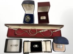 A group of silver dress rings, pendant, etc.