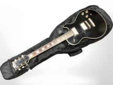 A Japanese copy of a Les Paul electric guitar, in soft carry bag.