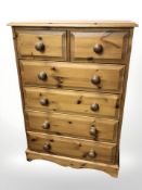 A modern pine six drawer chest, 76 cm x 50 cm x 111 cm.