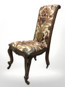 A Victorian mahogany occasional chair in tapestry fabric