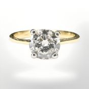 An 18ct gold diamond solitaire ring,