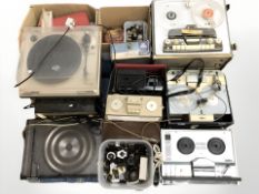 A group of vintage radios, turntables, reel to reel players and similar equipment.