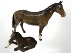 A Beswick brown gloss horse and a foal.