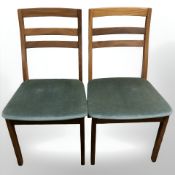 A pair of Nathan teak ladder back dining chairs