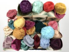 A large quantity of vintage ladies hats, with Bainbridges boxes.
