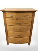 A modern five drawer bow-front chest,