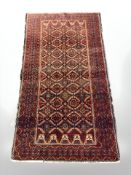 A Balouch rug, Afghanistan, 174 cm x 97 cm.