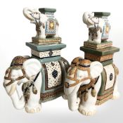 A pair of ceramic elephant plant stands, height 40 cm, and a further miniature pair.