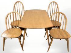 An Ercol elm and beech drop leaf dining table, width 113 cm,