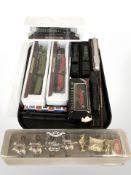 A group of scale model locomotives on plinths,