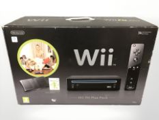 A Nintendo Wii Fit plus pack, in box.