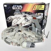A Kenner Star Wars Millennium Falcon model with original box and two further models