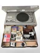 A Panasonic SG 4000 stereo music system and a box of vintage cameras and related equipment