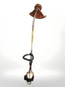 A Stihl petrol grass strimmer