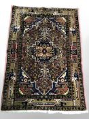 An Afghan / Caucasian rug, 149 cm x 103 cm.