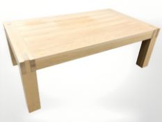A modern oak veneered coffee table,