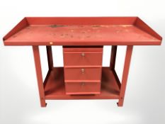 An enameled metal work shop bench, 151 cm x 66 cm x 100 cm,