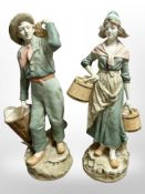 A pair of Bohemian porcelain figures of a lady and gentleman carrying pails and baskets,